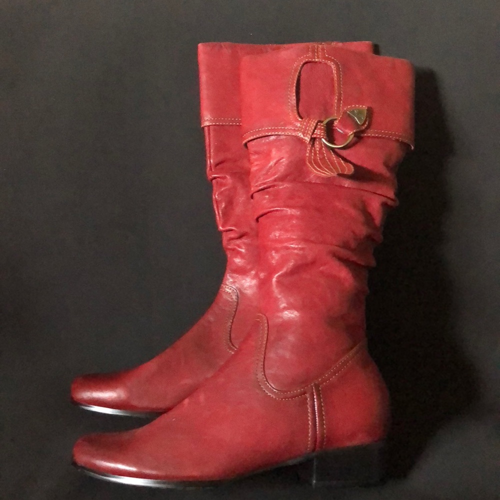 Red tall boots. Leather.